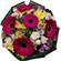 Rumba. Tight, rich round bouquet of gerbera daisies, spray roses, chrysanthemums and alstroemerias.. Den Haag