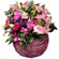 Spring Garden. Refined basket arrangement in tender spring colors.. Den Haag